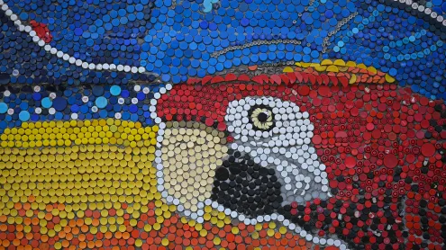 Bottle-cap mural made by Oscar Olivares in Guatire, Venezuela (© FEDERICO PARRA/AFP via Getty Images)