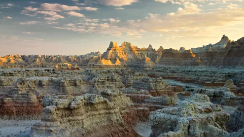 Sunset over Badlands National Park, South Dakota (© Petr Bednarik/Danita Delimont/Alamy)