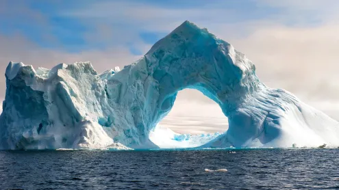 Natural arch carved in an iceberg, Antarctica (© Gabrielle/Adobe Stock)