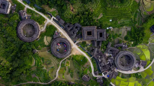 Fujian Tulou complex of historical and cultural heritage buildings in Fujian province, China (© Hongjie Han/Getty Images)