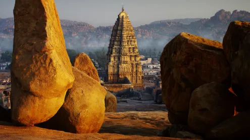 Granite rocks and gopuram of the Virupaksha Temple, Hampi, Karnataka (© Skouatroulio/Getty Images)