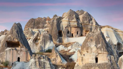 Fairy chimneys and cave dwellings in Cappadocia, Türkiye (© Storm Is Me/Shutterstock)