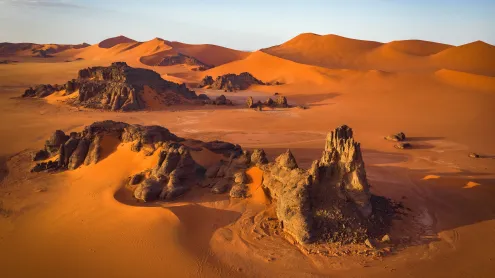 Rock formations and sand dunes in the Sahara, Tassili n’Ajjer, Algeria (© Airpano/Amazing Aerial Agency)