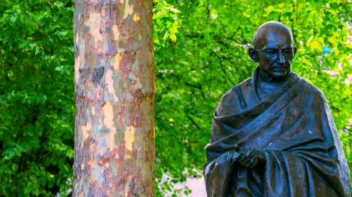Statue of Mahatma Gandhi at Parliament Square, Westminster, UK (© cowardlion/Shutterstock)