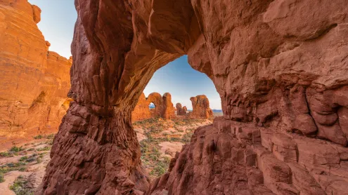 Double Arch seen through Cove Arch, Arches National Park, Utah (© Jeff Foott/Minden Pictures)