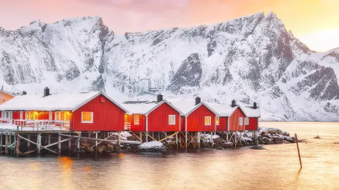 Traditional red fishermen's cabins on the shore of Reinefjorden, Norway (© Pilat666/Getty Images)