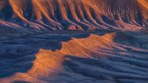 Sandstone formations in the badlands near Caineville, Utah (© Chris Moore/TANDEM Stills + Motion)