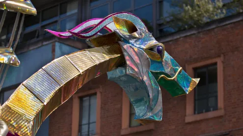 A large mechanical dragon at Saint George's Day celebrations (© MediaWorldImages/Alamy Stock Photo)